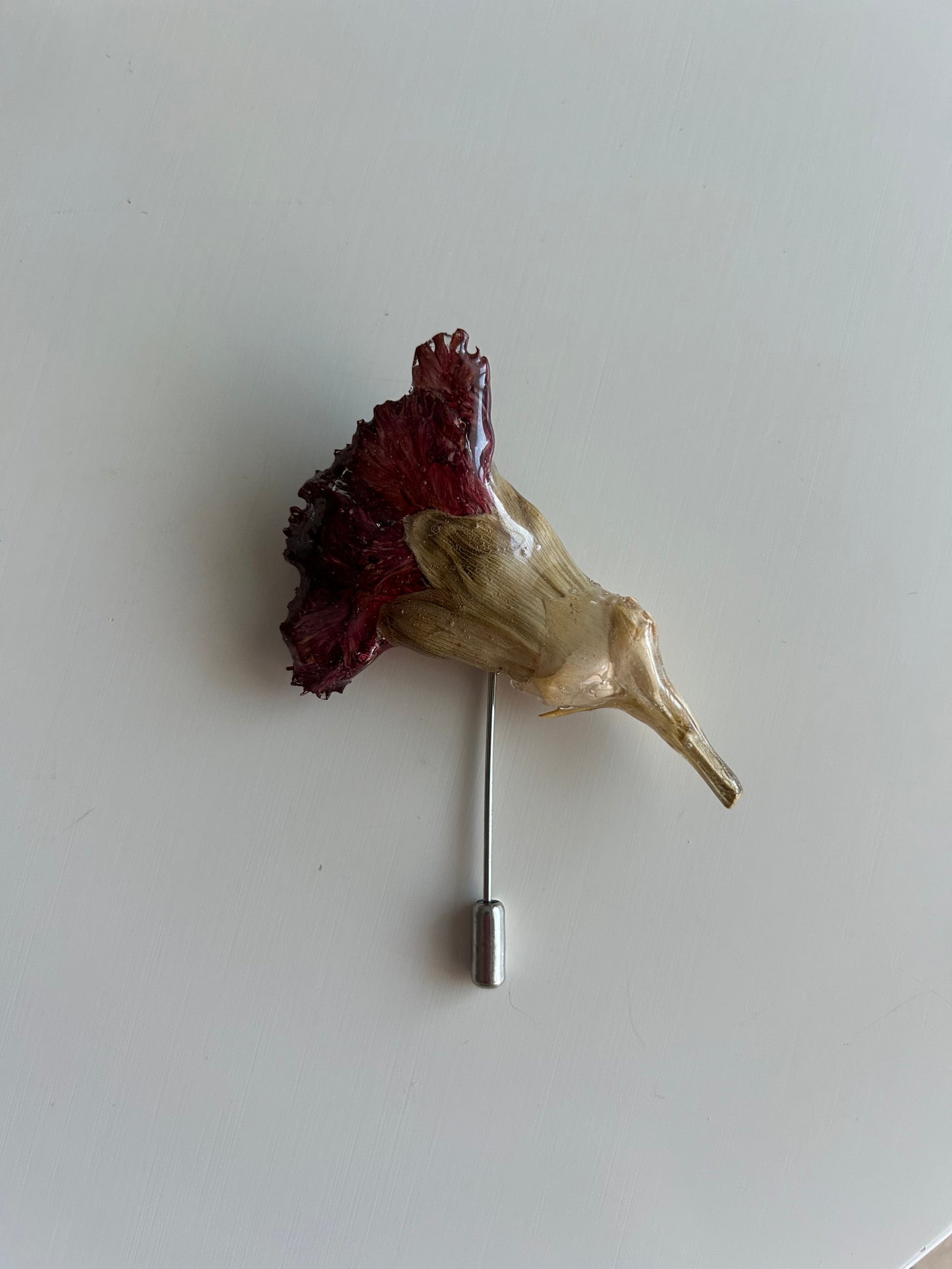 pregadeira cravo vermelho