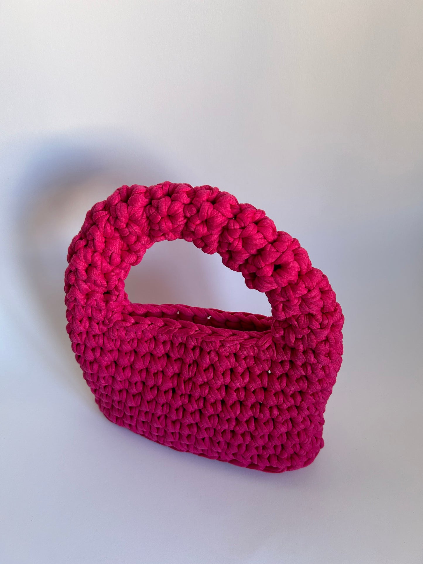 pink crochet handbag