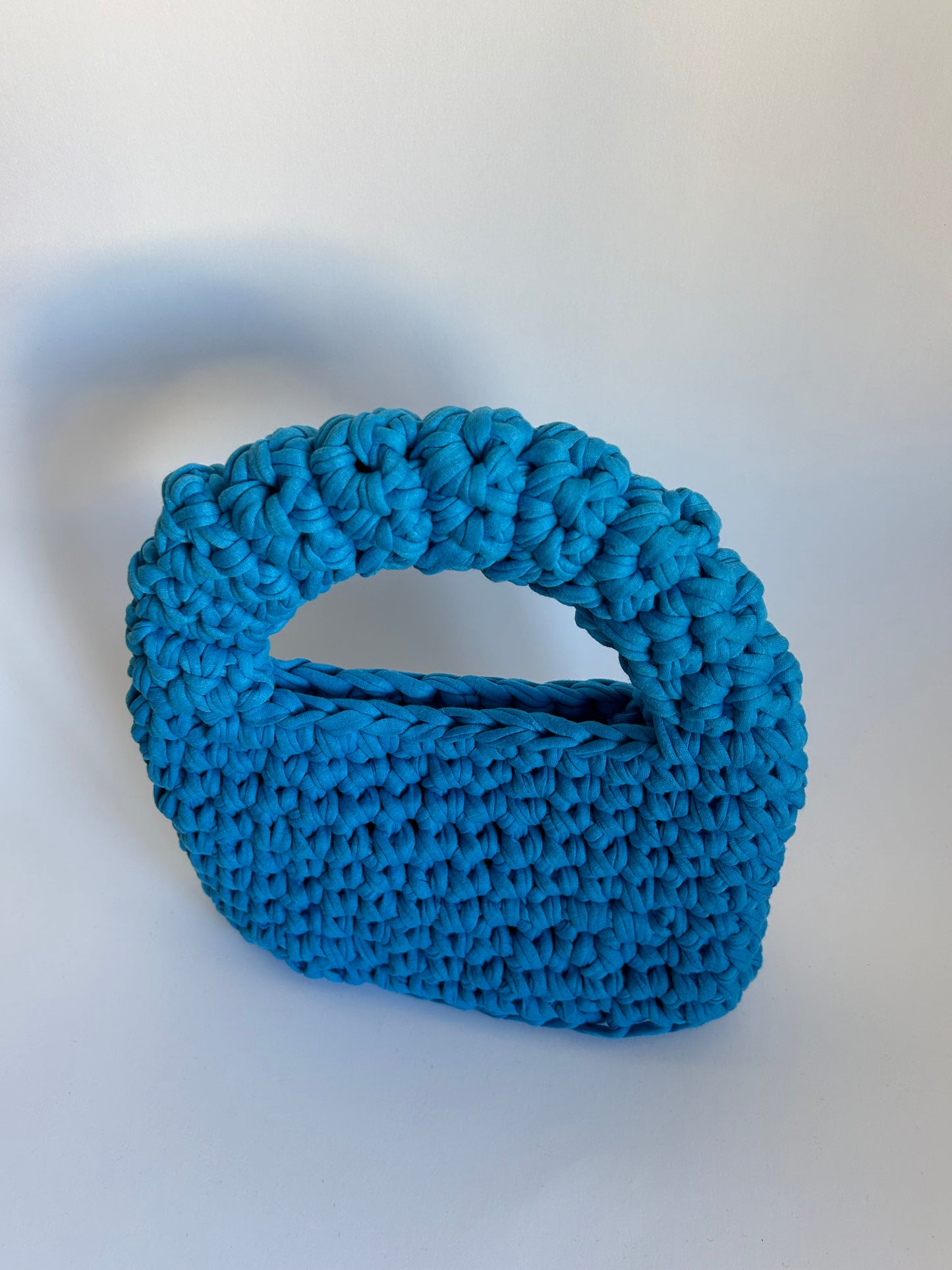 blue crochet handbag