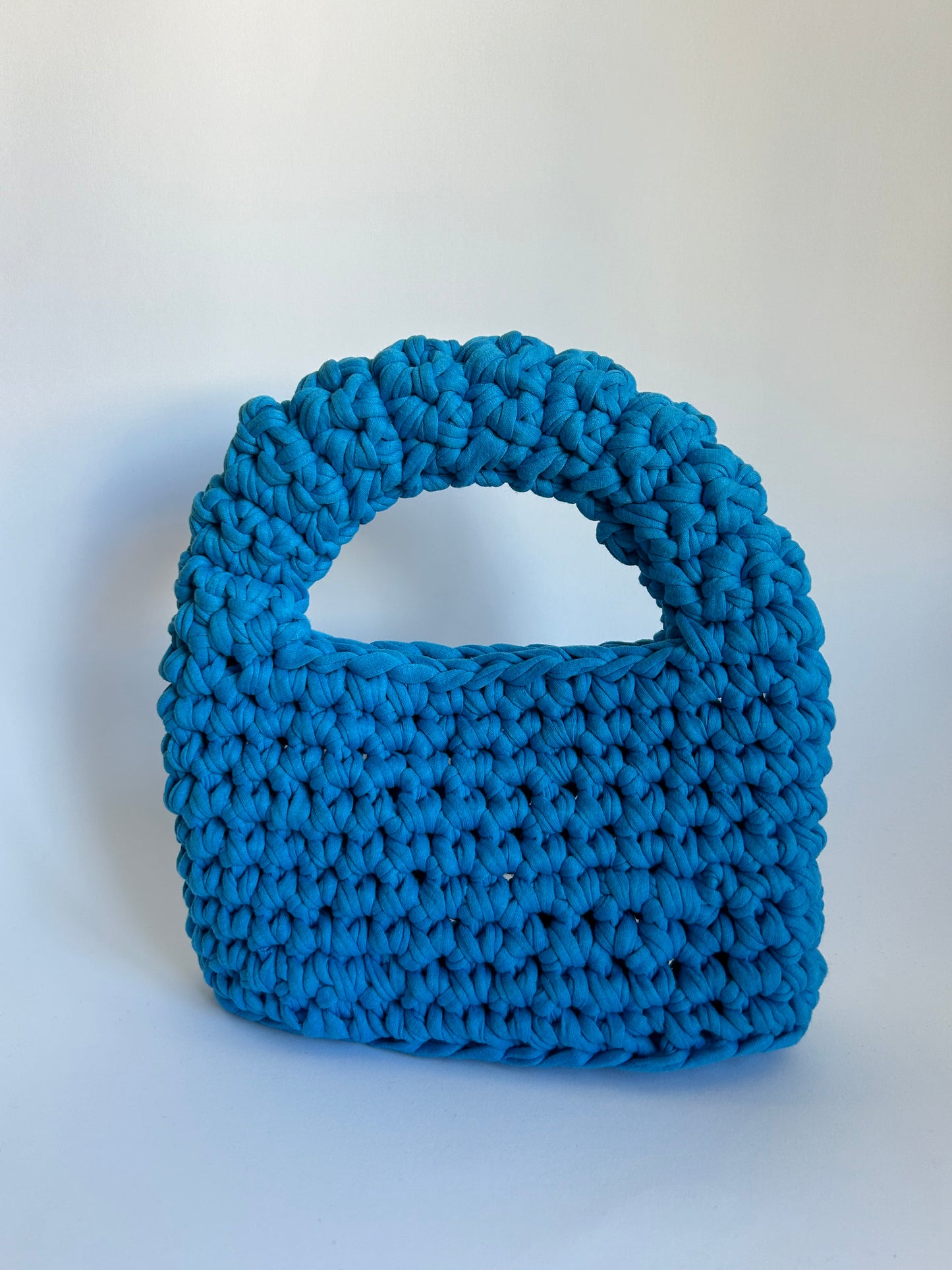 blue crochet handbag