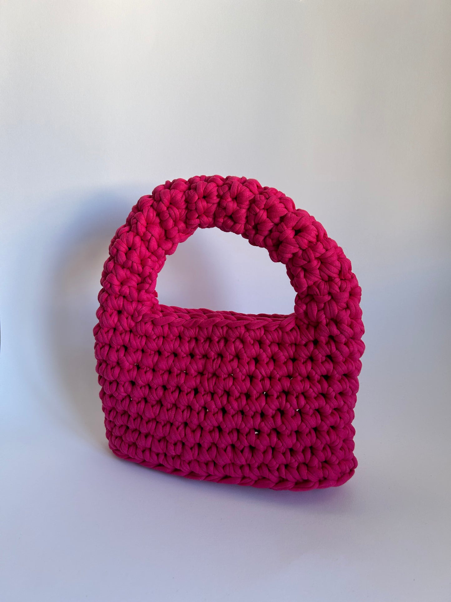 pink crochet handbag